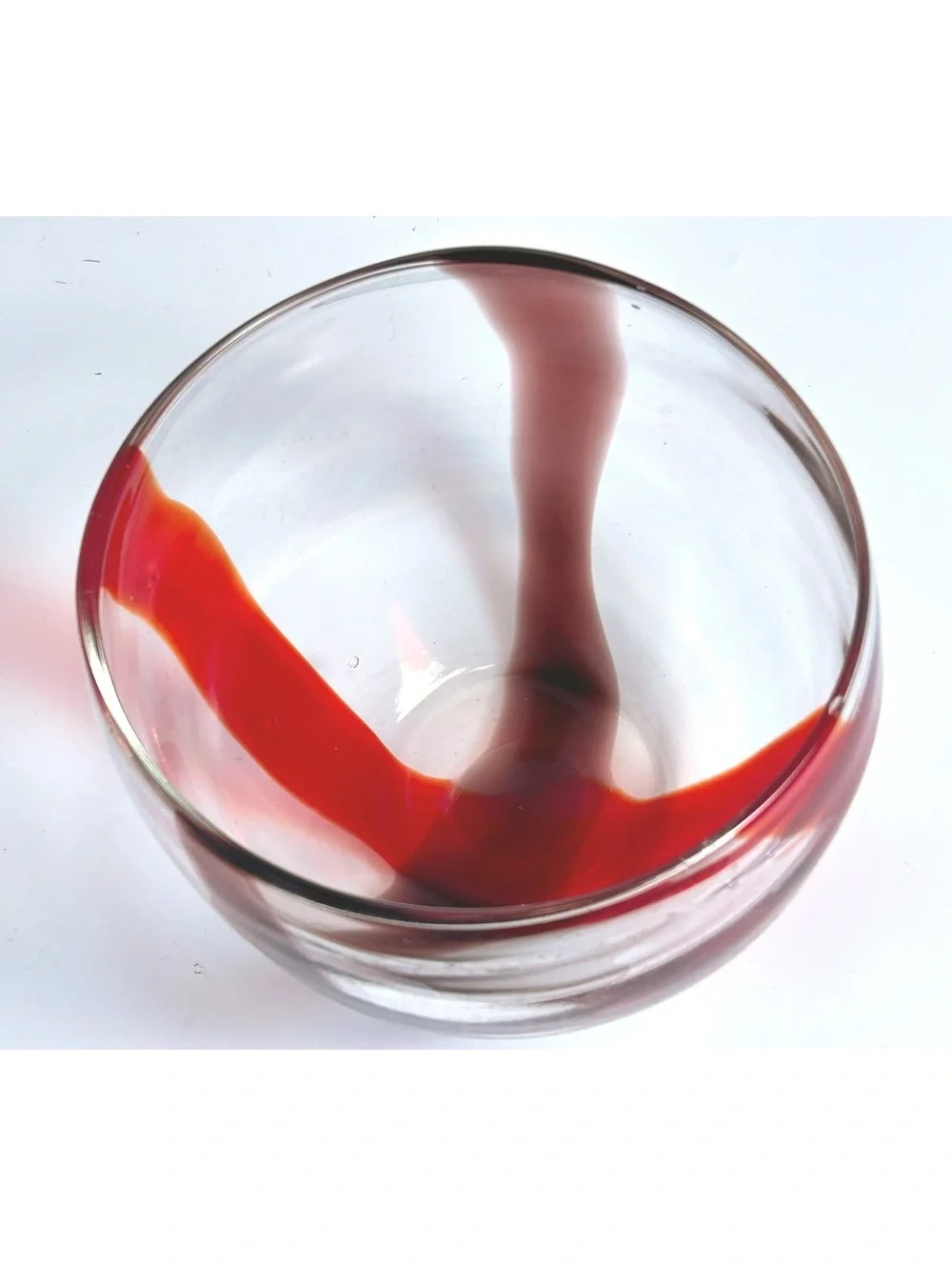 Hand-Blown Glass Bowl with Red Swirl Design